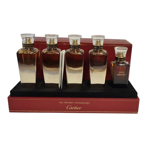 100 - CARTIER, A CASED 'LES HEURES VOYAGEUSES' FIVE PERFUME BOTTLE SET
Titled 'Oud and Oud, Oud and Rose, ... 