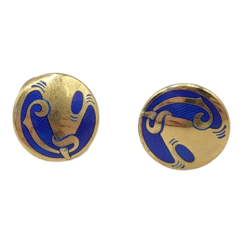 99 - LIBERTY, A PAIR OF SILVER GILT AND ENAMEL GENTS CUFFLINKS
Art nouveau design blue enamel marked Libe... 