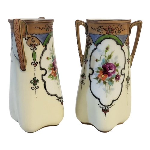 327A - NORITAKE, A PAIR OF EARLY 20TH CENTURY JAPANESE PORCELAIN VASE
Twin handled with hand painted decora... 