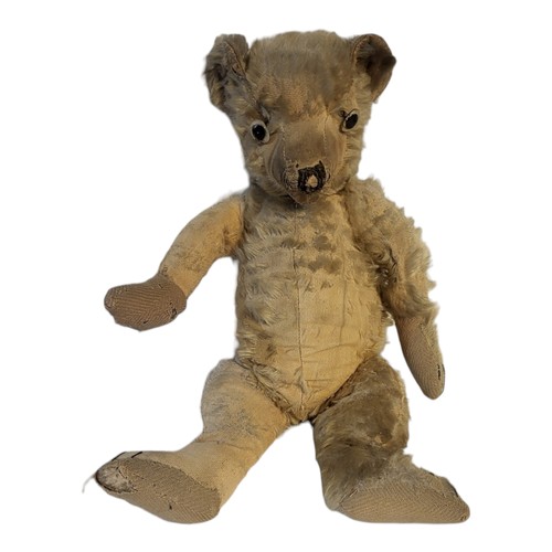 311A - AN EARLY 20TH CENTURY PLUSH MOHAIR TEDDY BEAR
Having glass eyes, elongated nose and arms.
(approx 41... 