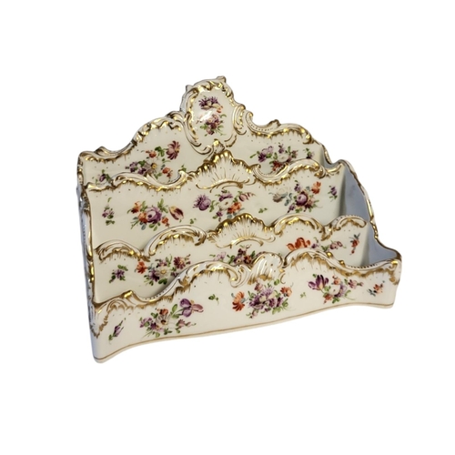 105 - A LATE 19TH CENTURY DRESDEN FACTORY HARD PASTE PORCELAIN LADIES’ LETTER RACK
Three section ladies’ t... 