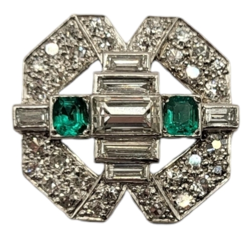 10A - A WHITE METAL DIAMOND AND EMERALD PLAQUE PENDANT
Having an arrangement of graduated baguette cut dia... 