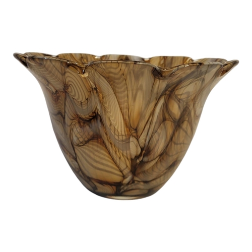 111 - WATERFORD, A LARGE COLOURED GLASS BOWL
Having a scalloped edge with mottled beige effect, engraved m... 