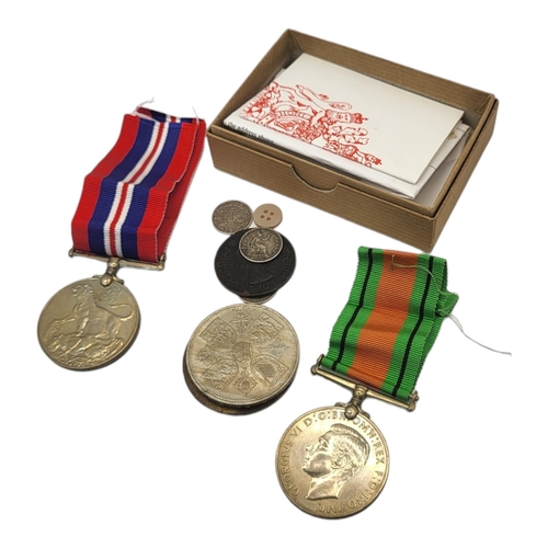 14 - A PAIR OF WWII BRITISH ARMY WAR MEDALS
Comprising a Defence medal, war medal and certificate, togeth... 