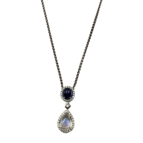 15A - AN 18CT WHITE GOLD, STAR SAPPHIRE AND MOONSTONE PENDANT NECKLACE
Cabochon cut pale blue sapphire and... 