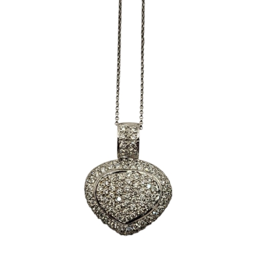 16A - AN 18CT WHITE GOLD AND DIAMOND HEART FORM PENDANT NECKLACE
Having an arrangement of pave set diamond... 