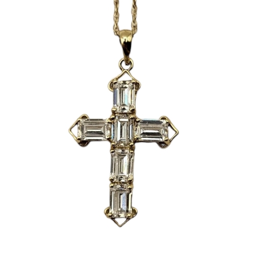 19 - A CONTINENTAL 14CT GOLD AND QUARTZ SET PENDANT CROSS AND NECKLACE
Baguette cut stones on fine link 1... 