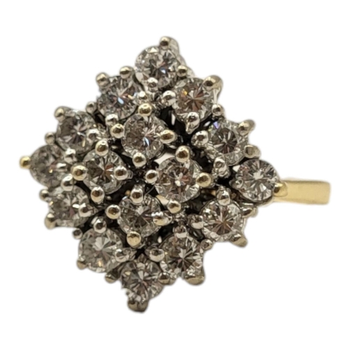 19A - AN 18CT GOLD AND DIAMOND CLUSTER RING
Having an arrangement of round cut diamonds forming a diamond ... 