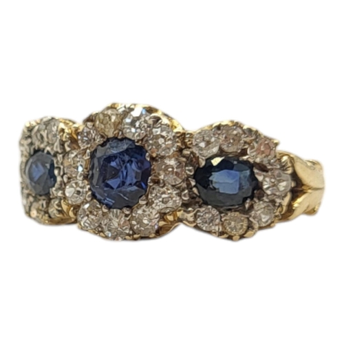 20A - A VINTAGE YELLOW METAL SAPPHIRE AND DIAMOND CLUSTER RING
The oval and round cut sapphires edged in d... 