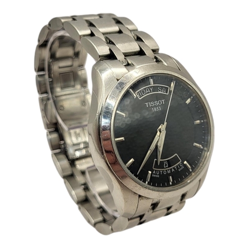 95 - TISSOT, A VINTAGE GENT’S STAINLESS STEEL AUTOMATIC WRISTWATCH
Black dial marked ‘TISSOT 1853’ with d... 