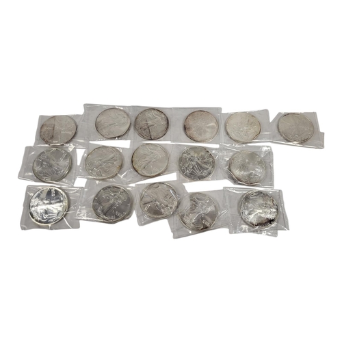 108 - A CONSECUTIVE RUN OF SIXTEEN 20TH CENTURY AMERICAN SILVER LIBERTY DOLLAR 1OZ COINS, DATING FROM 1986... 