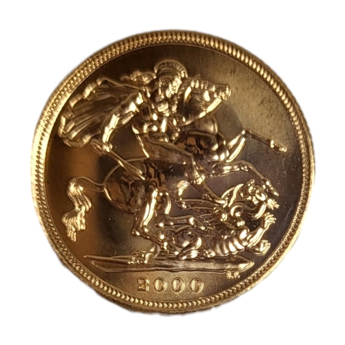 113 - A 22CT GOLD FULL SOVEREIGN COIN, DATED 2000 
With King George and Dragon to reverse, in a protective... 