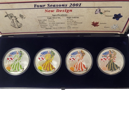 115 - A SET OF FOUR AMERICAN SILVER AND ENAMEL 1 oz DOLLAR PROOF COINS,titled ‘Four Seasons 2001’
In prote... 