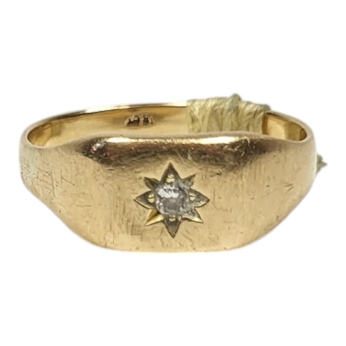 118 - A VINTAGE 18CT GOLD AND DIAMOND GENTS SIGNET RING
The single round cut diamond in a rub over setting... 