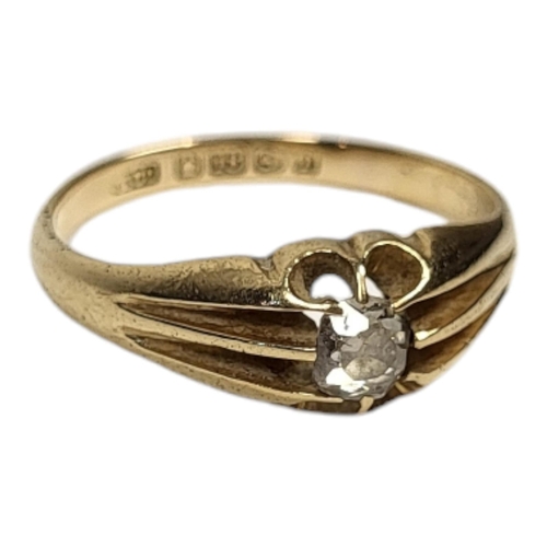 21 - A VINTAGE 18CT GOLD AND DIAMOND GENTS SIGNET RING
Having a single round cut diamond in a claw settin... 