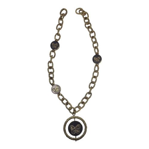 22 - BOTTEGA VENETA, A SILVER GILT NECKLACE
Heavy gauge rope twist links with ebonised wooden spacers and... 