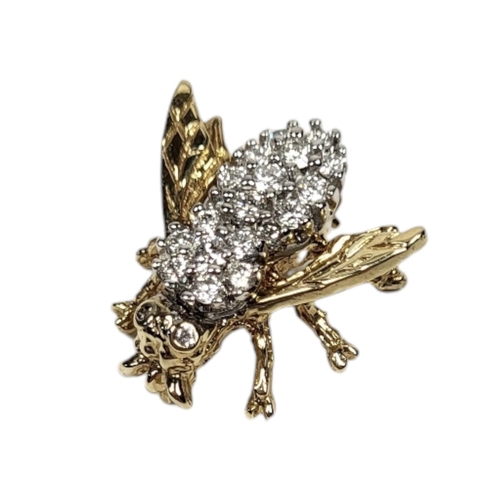 28 - A 14CT GOLD AND DIAMOND INSECT BROOCH
Having an arrangement of round cut diamonds forming a bee desi... 