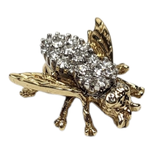 28 - A 14CT GOLD AND DIAMOND INSECT BROOCH
Having an arrangement of round cut diamonds forming a bee desi... 