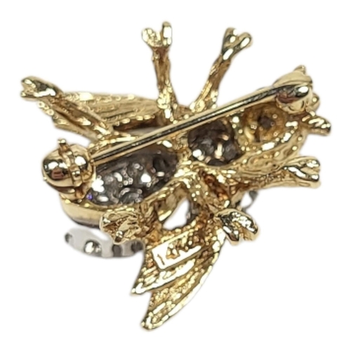 28 - A 14CT GOLD AND DIAMOND INSECT BROOCH
Having an arrangement of round cut diamonds forming a bee desi... 