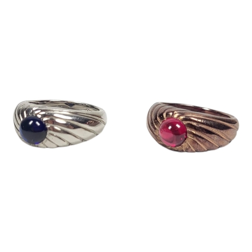 36 - WITHDRAWN A PAIR OF 18CT GOLD AND CABOCHON CUT GEM SET RINGS
In yellow and white gold with fluted de... 