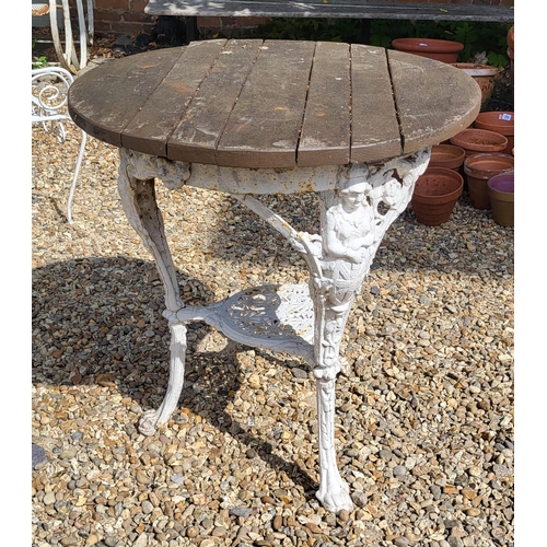 577 - A VICTORIAN CAST IRON BRITANNIA TABLE
With circular teak top three legs and under tier.
(diameter 58... 