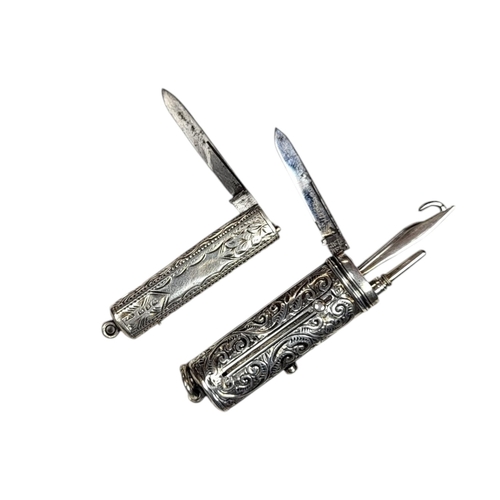 60 - A VICTORIAN SILVER COMBINATION PROPELLING ETUI
Containing a toothpick, penknife, button hook and pen... 