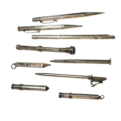 64 - A COLLECTION OF VINTAGE SILVER PROPELLING PENCILS
To include a novelty large screw and a pencil with... 