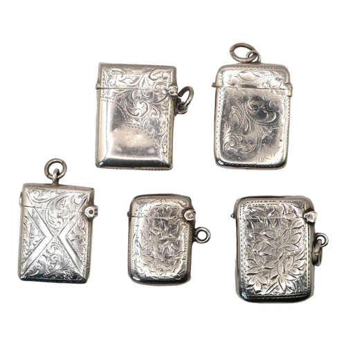 72 - A COLLECTION OF FIVE LATE 19TH/EARLY 20TH CENTURY SILVER VESTA CASES
Having engraved decoration, hal... 