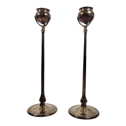 77 - A PAIR OF MODERN SOLID STERLING SILVER ARCHIBALD KNOX LIBERTY CYMRIC STYLE CANDLESTICKS BY WILLIAM W... 