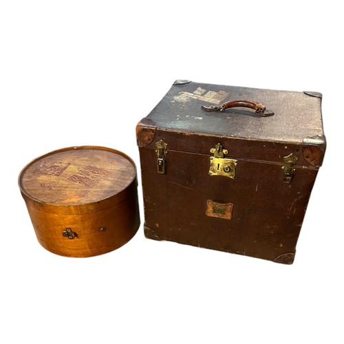 582 - AN EARLY 20TH CENTURY BROWN WREXIN TRAVEL TRUNK
With internal tray along with a bye gone large circu... 