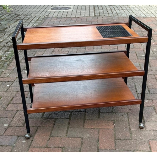 587 - A MID CENTURY TEAK & STEEL HOSTESS TROLLEY of three tiers, with two candle heating grill
on castors
... 