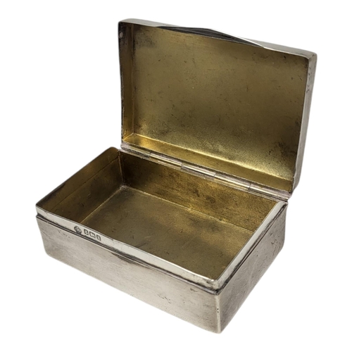 AN EARLY 20TH CENTURY SILVER SNUFF BOX Rectangular form, with dome top ...