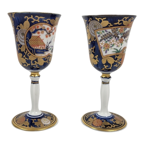 824 - A PAIR OF 20TH CENTURY JAPANESE EXPORT LUXURIOUS PORCELAIN GOBLETS
Imari palette, with inverted balu... 