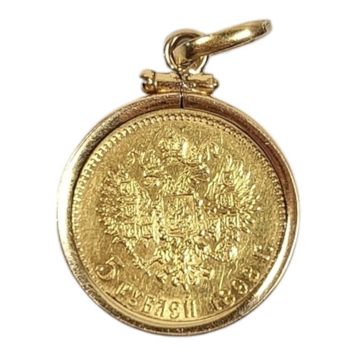 661 - NICHOLAS II CZAR OF RUSSIA, 1894 - 1917, A HIGH CARAT GOLD 5 RUBLES COIN PENDANT, DATED 1898
Set wit... 