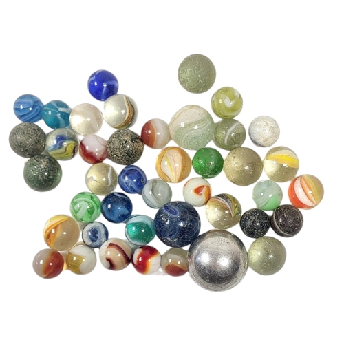 834 - A VICTORIAN, EDWARDIAN AND LATER VINTAGE GLASS MARBLES
A fine and extensive collection of over 300 p... 