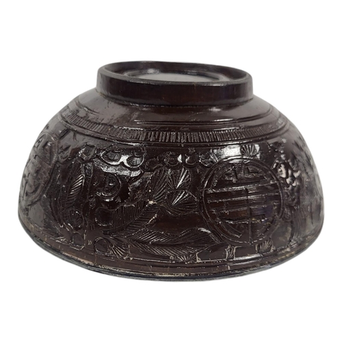 840 - A 19TH CENTURY CHINESE SILVER AND CARVED COCONUT BOWL.
(diameter 11cm x 5cm)

Condition: some light ... 