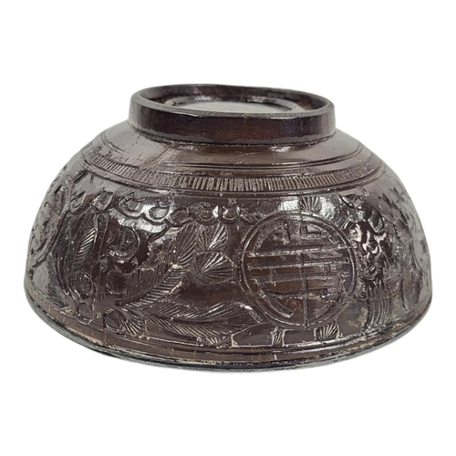 840 - A 19TH CENTURY CHINESE SILVER AND CARVED COCONUT BOWL.
(diameter 11cm x 5cm)

Condition: some light ... 