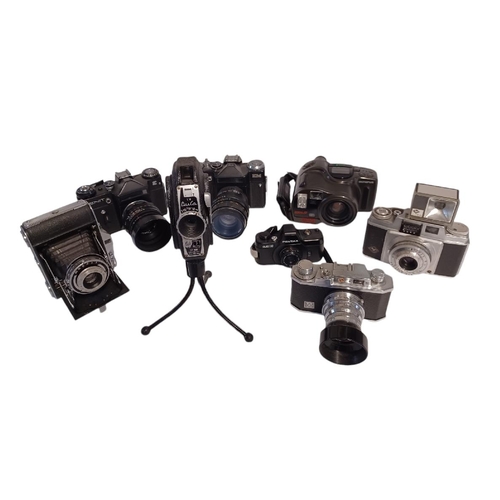 448 - DURST, ZENIT, OLYMPUS, PENTAX, AGFA, ENSIGN. Collection of 8 cameras, Zenit E and EM 35mm SLRs, Olym... 