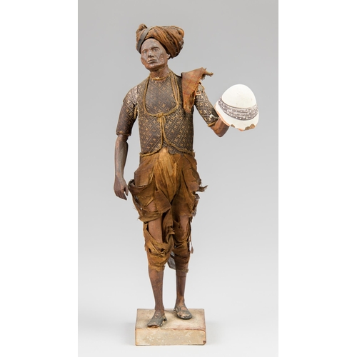 117 - A 19TH CENTURY CLAY INDIAN FIGURE ATTRIBUTED TO JADUNATH PAL (1821-1920).
Made in Krishnanagar (near... 