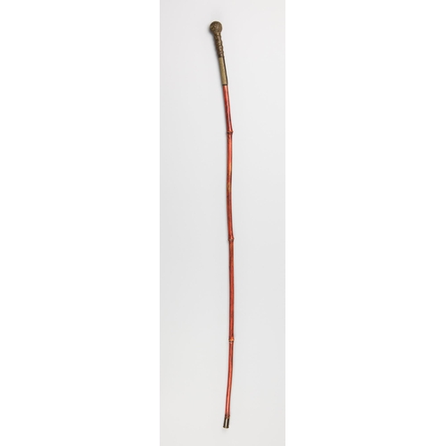 160 - AN INDIAN RAJ PERIOD BAMBOO SWAGGER STICK.
With a .303 bullet shell mounted to the tip. (77cm)