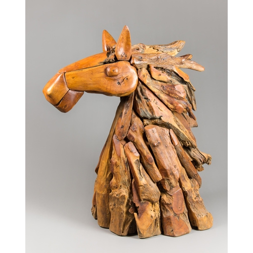 36 - A CARVED DRIFTWOOD HORSE HEAD SCULPTURE.
(h 88cm x w 75cm x d 25cm)