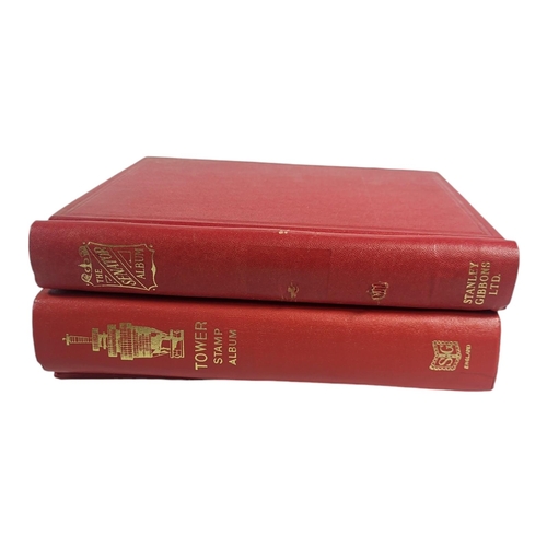 410 - GROUP OF THREE STANLEY GIBBONS STAMP ALBUMS.