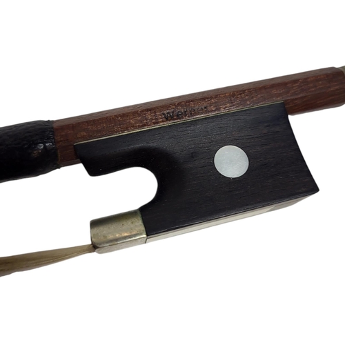 546 - WERNER, A HALF SIZE VIOLIN BOW
Round stick, ebony frog pearl, stamped.
(54g, 61.5cm)

Condition: som... 