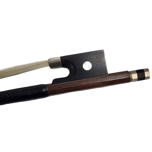 546 - WERNER, A HALF SIZE VIOLIN BOW
Round stick, ebony frog pearl, stamped.
(54g, 61.5cm)

Condition: som... 