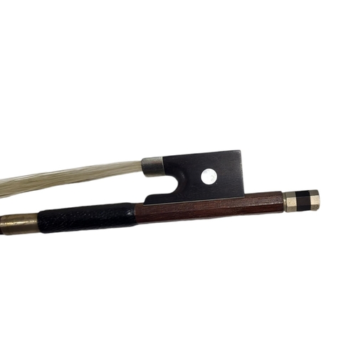 546 - WERNER, A HALF SIZE VIOLIN BOW
Round stick, ebony frog pearl, stamped.
(54g, 61.5cm)

Condition: som... 