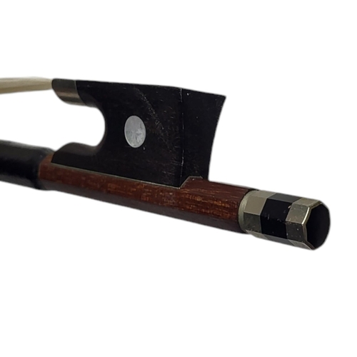 546 - WERNER, A HALF SIZE VIOLIN BOW
Round stick, ebony frog pearl, stamped.
(54g, 61.5cm)

Condition: som... 