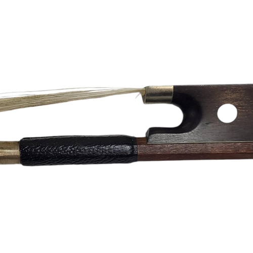 546 - WERNER, A HALF SIZE VIOLIN BOW
Round stick, ebony frog pearl, stamped.
(54g, 61.5cm)

Condition: som... 