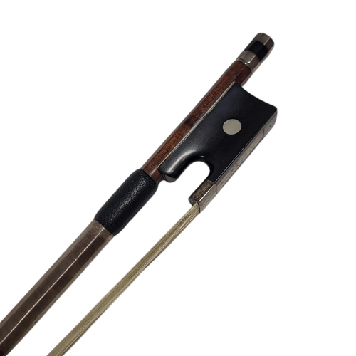 549 - IN THE MANNER OF TUBBS, A 19TH CENTURY VIOLIN BOW
Round stick, white metal mounted frog with Pearl e... 