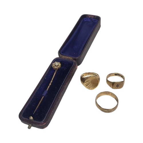 552 - TWO EARLY 20TH CENTURY 9CT GOLD GENT’S SIGNET RINGS
Along with a 9ct gold wedding band, plain round ... 