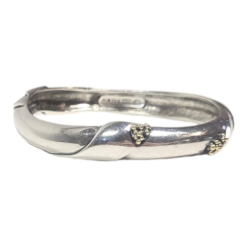 574 - GEORG JENSEN, A 20TH CENTURY DANISH SILVER BANGLE
Rope twist with berries, marked ‘925 S Denmark 332... 